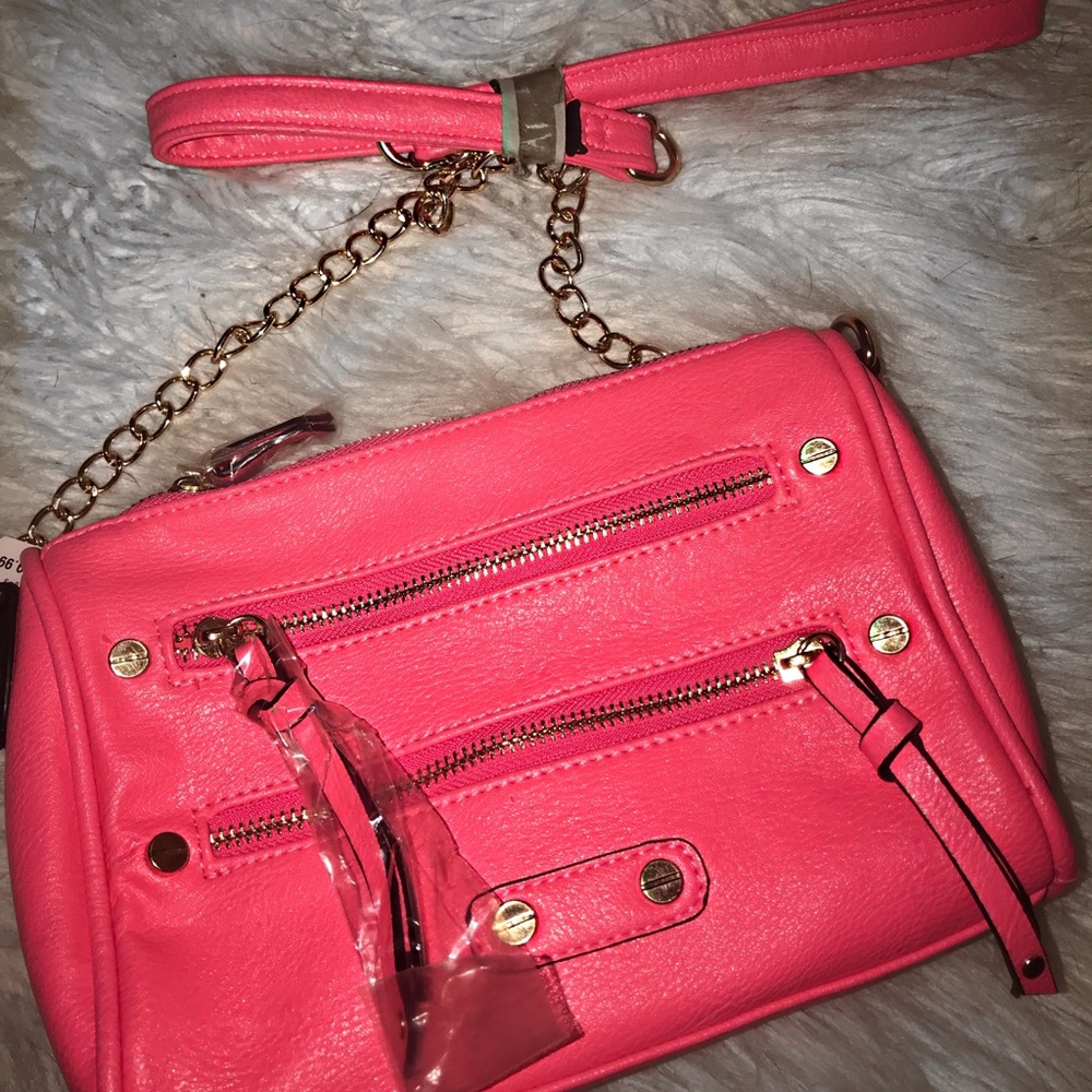Brand New Never worn Small “Call it Spring”bag